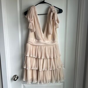 Tiered cream dress with bow straps